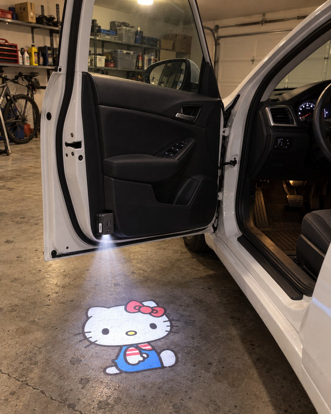 Sanrio Car Projector - Customer photo in a home garage